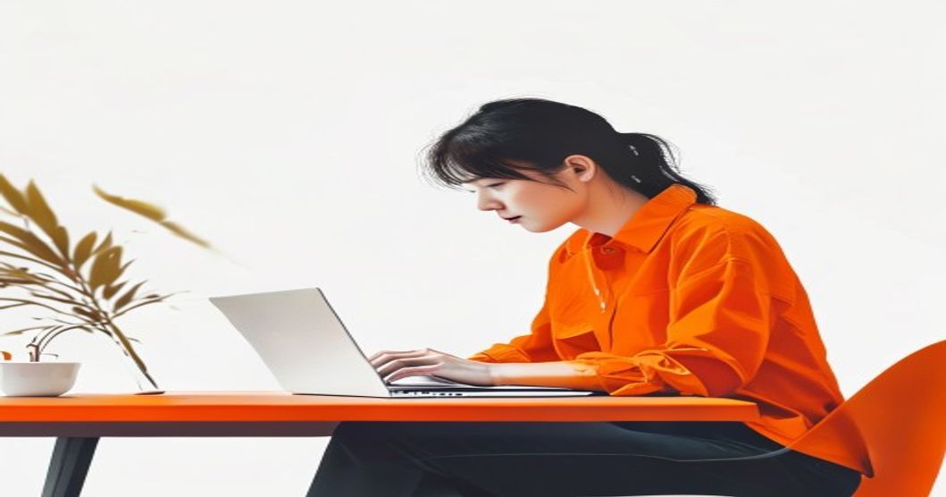 person working focused at cafe with laptop coffee